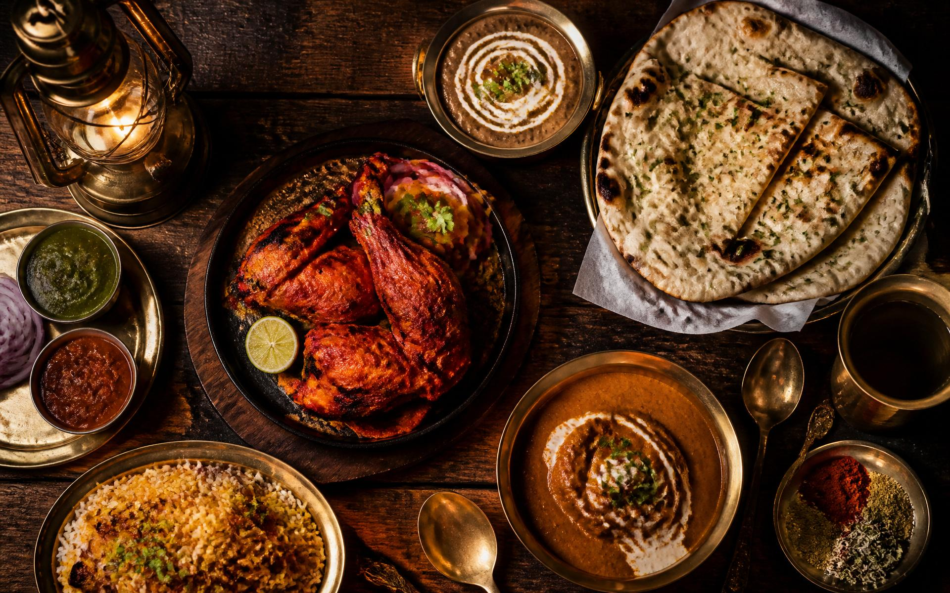 Authentic Indian dhaba feast on rustic wooden table